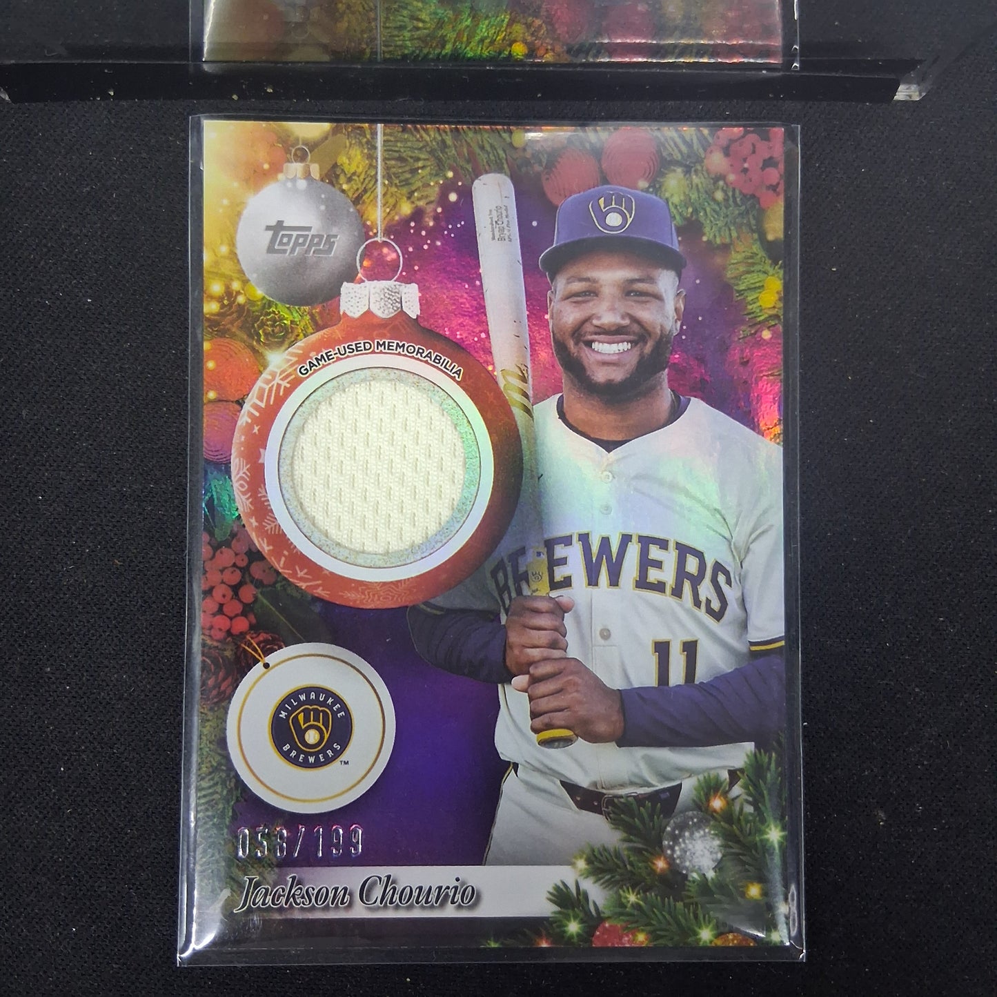 2025 Topps Holiday #PR-JC Jackson Chourio Player Relics Purple Metallic #/199