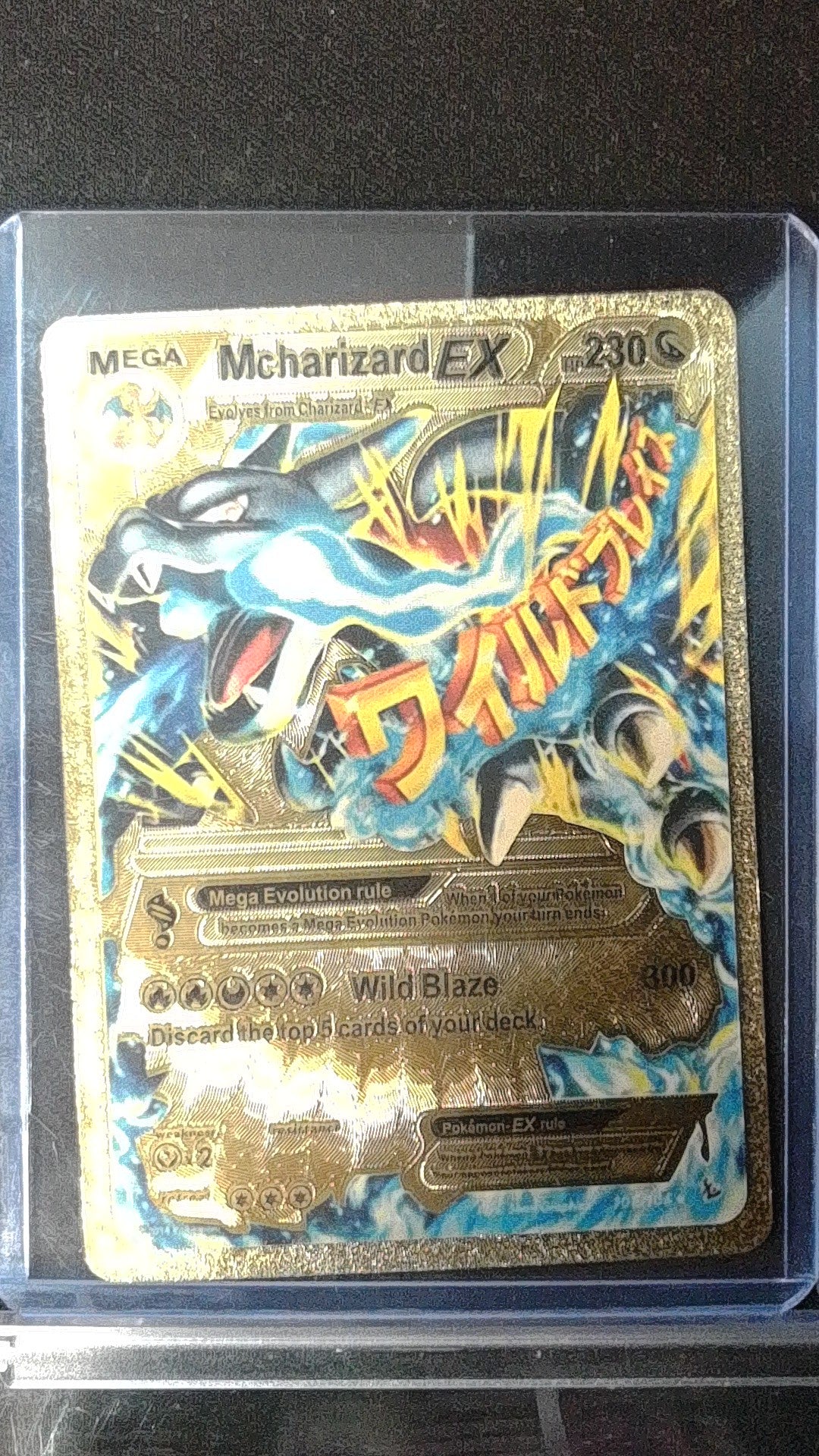 M Charizard EX (X) #69/106 Gold Promo