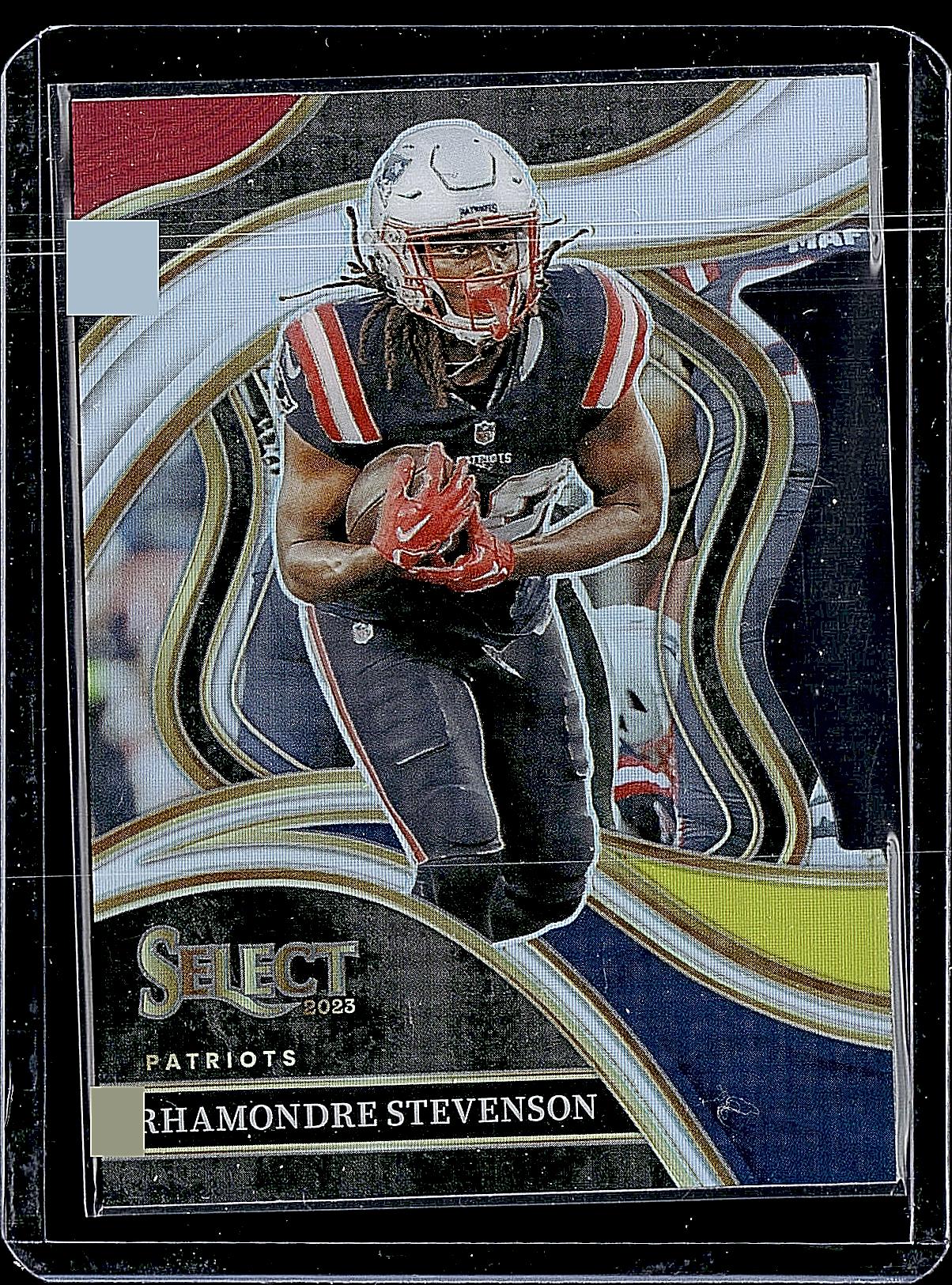 2023 Panini Select #223 Rhamondre Stevenson Red and Yellow Prizms Die Cuts