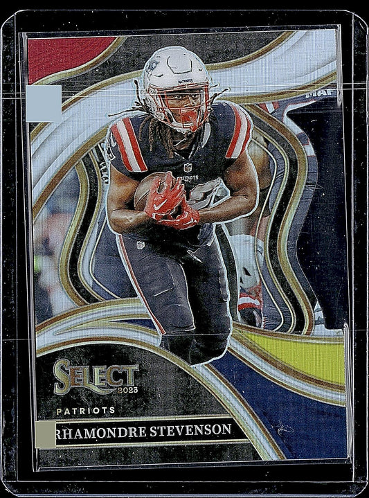 2023 Panini Select #223 Rhamondre Stevenson Red and Yellow Prizms Die Cuts